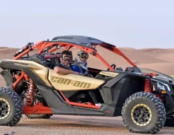 2-seater Can-Am Maverick X3 buggy on the Dubai dunes