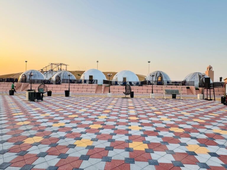 Overnight dome camp courtyard at sunset